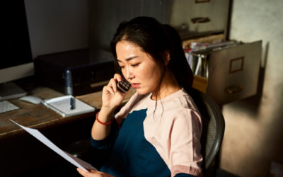 woman on the phone looking concerned